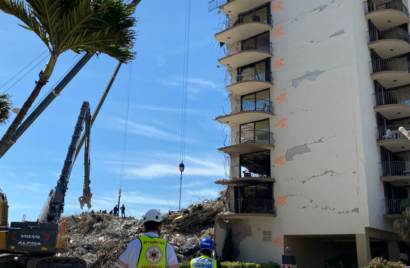 Hatzalah paramedics at the collapsed building in Miami Surfside (credit: HATZALAH UNITED)