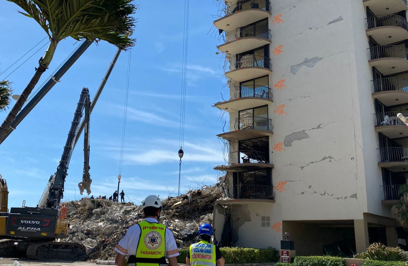 Hatzalah paramedics at the collapsed building in Miami Surfside (credit: MICHAEL STRONGIN/HATZALAH OF SOUTH FLORIDA)