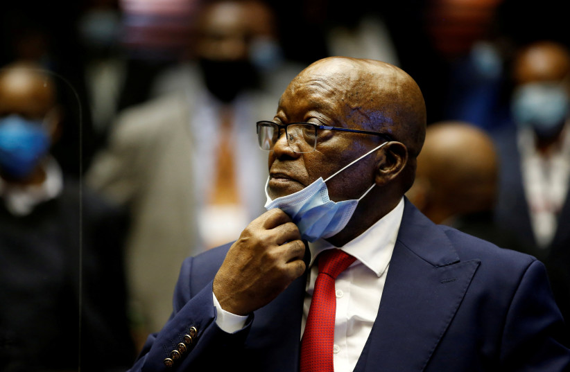 : Former South African President Jacob Zuma stands in the dock after recess in his corruption trial in Pietermaritzburg, South Africa, May 26, 2021 (credit: REUTERS)