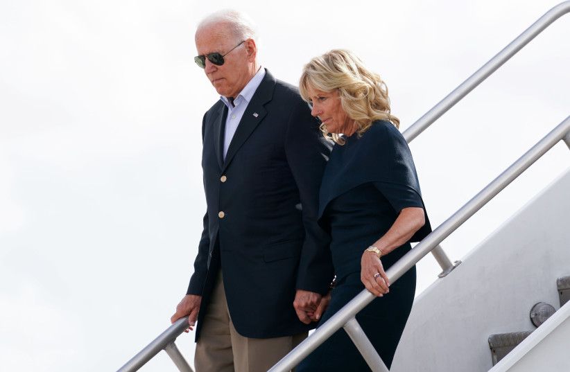 US President Joe Biden and first lady Jill Biden disembark from Air Force One as they arrive at Miami International Airport in Miami, Florida, U.S., July 1, 2021.  (credit: KEVIN LAMARQUE/REUTERS)