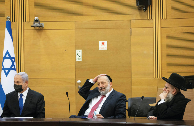 OPPOSITION LEADER Benjamin Netanyahu with Shas head Arye Deri and UTJ MK Ya’acov Litzman during a meeting with the opposition parties at the Knesset this week. (photo credit: YONATAN SINDEL/FLASH90)