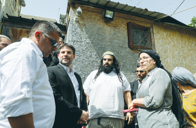 RELIGIOUS ZIONIST Party head Bezalel Smotrich (center-left) and supporters visit Sheikh Jarrah in May. (credit: OLIVIER FITOUSSI/FLASH90)