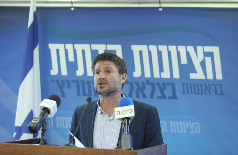 Religious Zionist Party head Bezalel Smotrich is seen addressing the Knesset on July 5, 2021. (photo credit: MARC ISRAEL SELLEM/THE JERUSALEM POST)