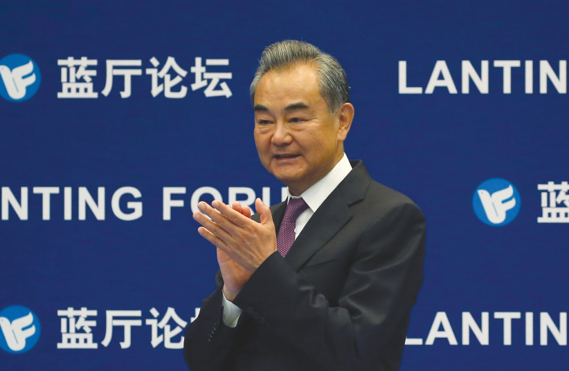 CHINESE FOREIGN MINISTER Wang Yi attends a Lanting Forum with the theme ‘China and the UN: Cooperation in 50 Years and Beyond,’ in Beijing last month. (credit: TINGSHU WANG/REUTERS)