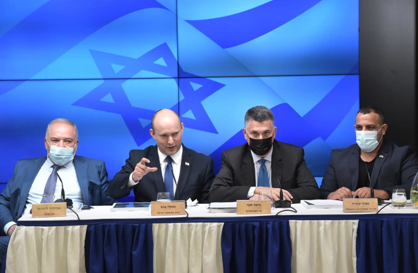 From left: Finance Minister Avigdor Liberman, Prime Minister Naftali Bennett, Justice Minister Gideon Sa'ar and Deputy Prime Minister Abir Kara. (photo credit: KOBI GIDEON/GPO)