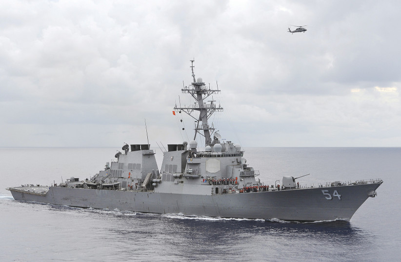 US NAVY guided-missile destroyer patrols in the Philippine Sea. The destroyer sailed within 12 nautical miles of an island claimed by China and two other states in the South China Sea in 2016 to counter efforts to limit freedom of navigation, the Pentagon said.  (credit: REUTERS)