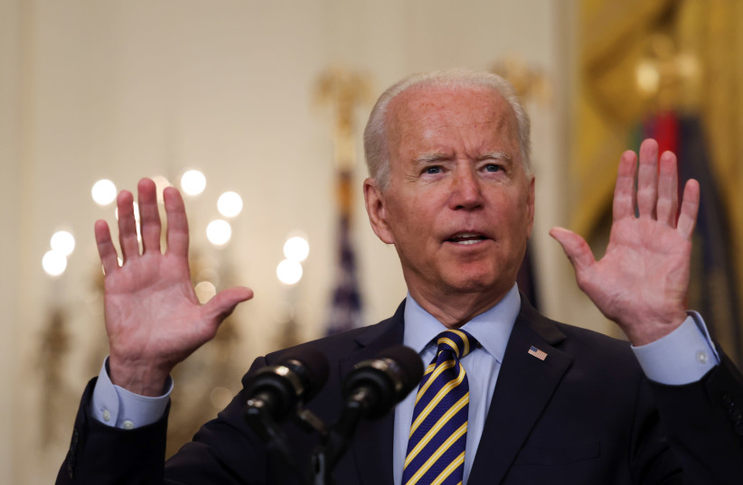 US President Joe Biden points a finger as he delivers remarks on the administration's continued drawdown efforts in Afghanistan in a speech from the East Room at the White House in Washington US, July 8, 2021. (photo credit: EVELYN HOCKSTEIN/REUTERS)