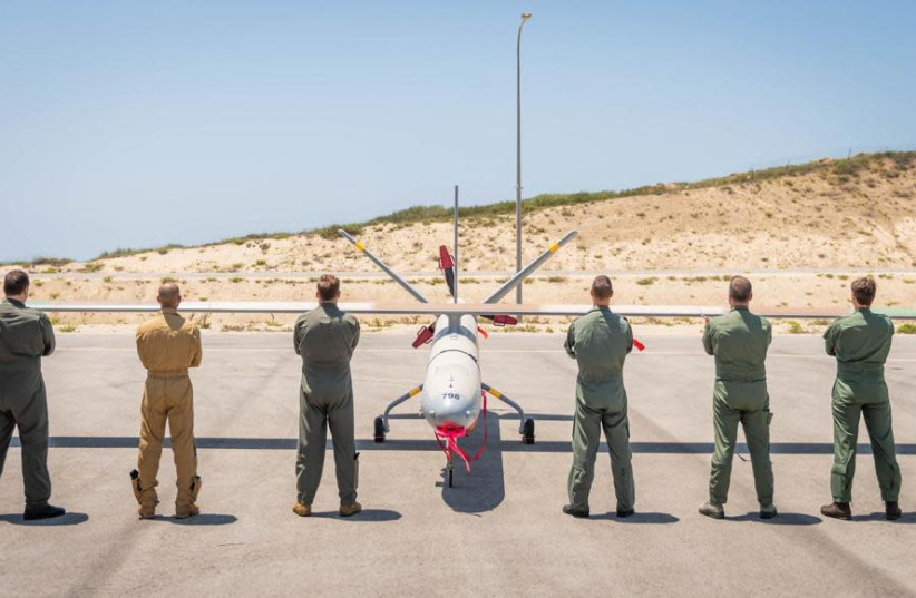 IAF soldiers are seen alongside a drone ahead of the international ''BLUE GUARDIAN'' drone drill. (credit: IDF SPOKESPERSON'S UNIT)