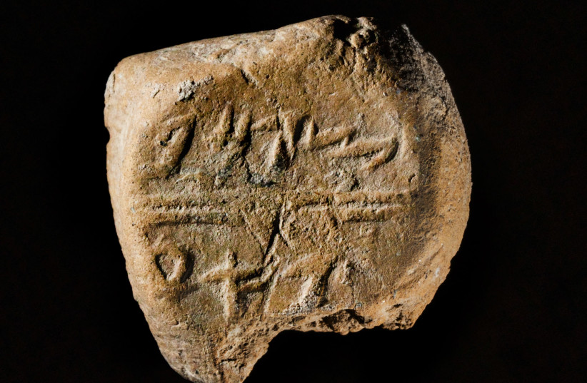 A stamp seal which bears the name “Tsafan" in ancient Hebrew script. (photo credit: KOBI HARATI/CITY OF DAVID)