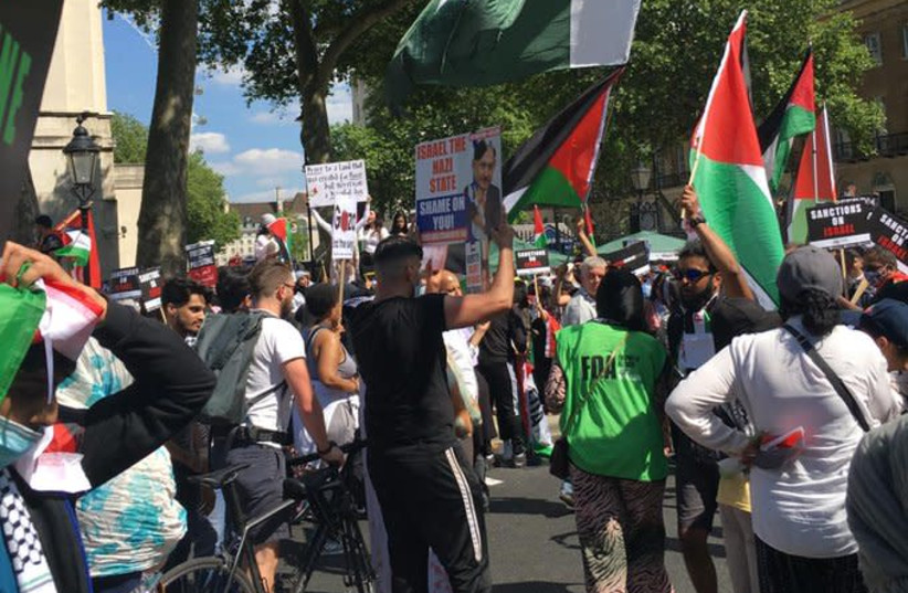 The ‘Netanyahu = Hitler’ sign at an anti-Israel demonstration in London  on June 12. (photo credit: LEE HARPIN/JEWISH NEWS)