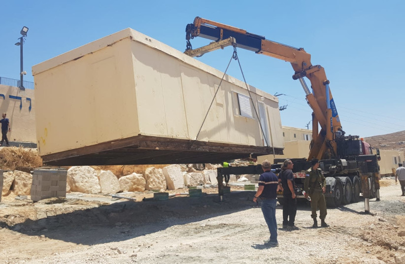 Evacuation of Beit Dror outpost, July 27, 2021 (photo credit: CHANA IVGI)