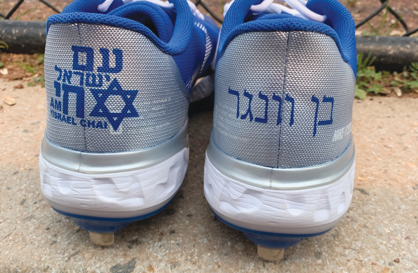  I GOT MY KICKS: Wanger’s personalized Olympic shoes (his name on the right, Am Yisrael Chai on the left), custom-made by teammate Alex Katz. (photographer: ELLI WOHLGELERNTER)