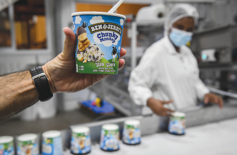  An ice cream assembly line at the Ben & Jerry's factory near Kiryat Malachi, July 2021 (credit: FLASH90)