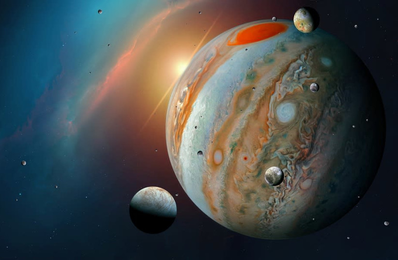 Jupiter, the solar system's largest planet, is seen alongside its moons (illustrative). (credit: PIXABAY)