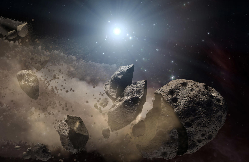 Image courtesy of NASA shows an artist's concept of a broken-up asteroid. Scientists think that a giant asteroid, which broke up long ago in the main asteroid belt between Mars and Jupiter, eventually made its way to Earth and led to the extinction of the dinosaurs. (photo credit: NASA/JPL-CALTECH/HANDOUT VIA REUTERS)