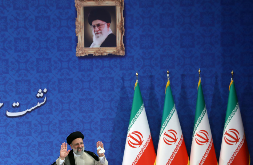 Iran's President-elect Ebrahim Raisi gestures at a news conference in Tehran, Iran June 21, 2021.  (credit: MAJID ASGARIPOUR/WANA (WEST ASIA NEWS AGENCY) VIA REUTERS)