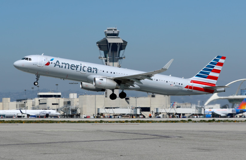 An American Airlines Airbus A321-200 plane takes off from Los Angeles International airport (LAX) in Los Angeles, California, US March 28, 2018.  (photo credit: REUTERS/MIKE BLAKE)