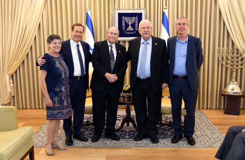 Mike Herzog (far L) with former-president Reuven Rivlin, former-Supreme Court Justice Elyakim Rubinstein and current President Isaac Herzog. (photographer: CHAIM TZACH/GPO)