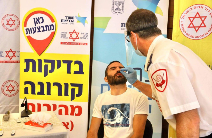 Izraēlā tiek izmantota ātrās koronavīrusa pārbaudes programma.  (Fotogrāfs: Mark Israel Slim/Jerusalem Post)