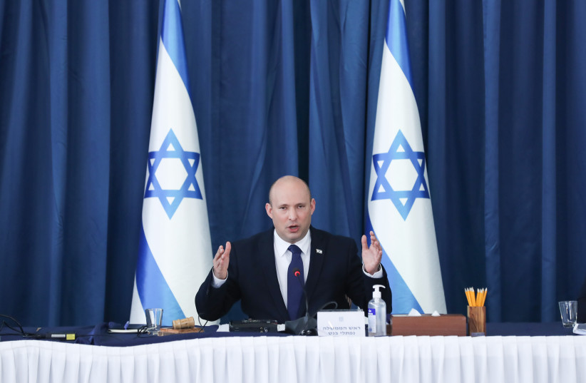 Israeli Prime Minister Naftali Bennett leads a cabinet meeting at the Prime Minister's Office in Jerusalem on August 8, 2021. (credit: OHAD TZVEIGENBERG‏/POOL)