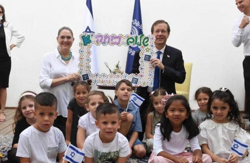  Michal and President Isaac Herzog with 1st grade children of Beit Hanassi Staff (credit: Courtesy)