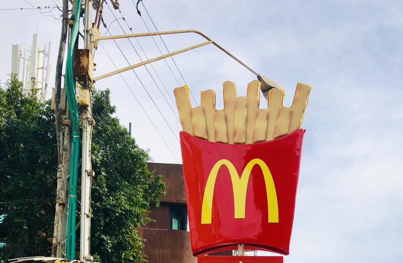McDonald's sign in Tel Aviv, 2019 (credit: TJEERD WIERSMA/FLICKR)