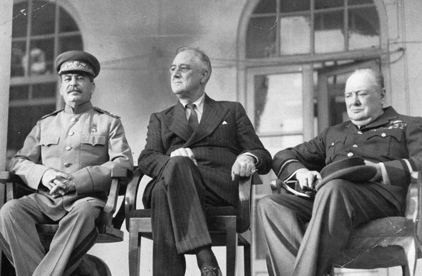  Joseph Stalin, Franklin D. Roosevelt, and Winston Churchill on the portico of the Russian Embassy during the Tehran Conference (credit: Franklin D. Roosevelt Presidential Library/Museum of the National Archives)