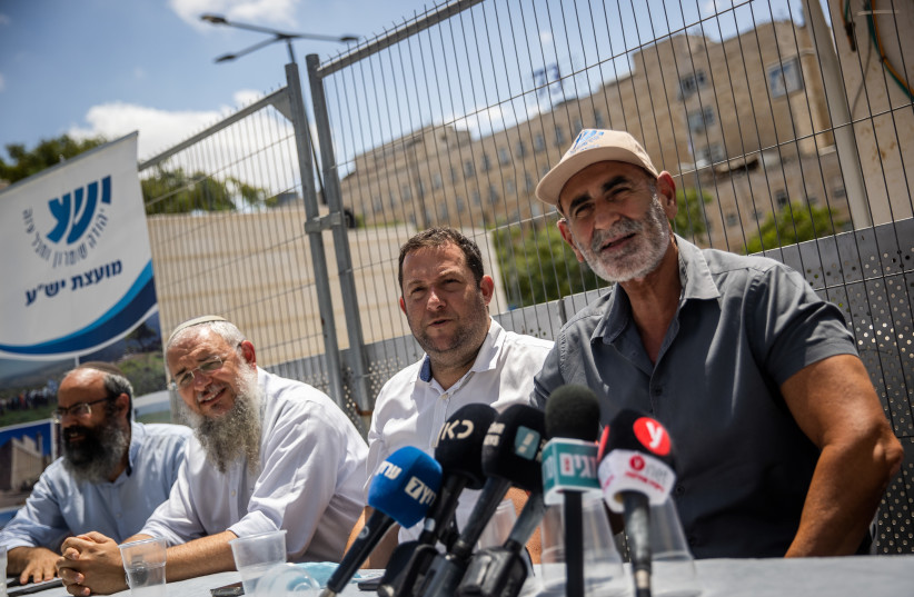 Judea, Samaria and the Jordan Valley heads of councils attend a press conference of the Yesha Council outside the Prime Minister's Office in Jerusalem, August 12, 2021 (photo credit: YONATAN SINDEL/FLASH90)