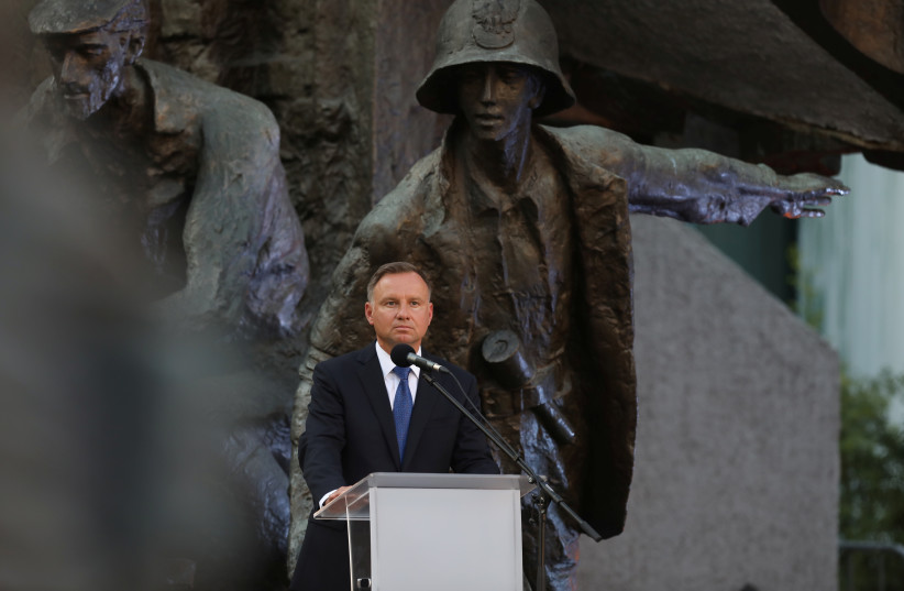  Poland's President Andrzej Duda attends a ceremony marking the anniversary of the 1944 Warsaw Uprising against Nazi occupants in Warsaw, Poland July 31, 2021. (credit: MACIEK JAZWIECKI/AGENJA GAZETA VIA REUTERS)