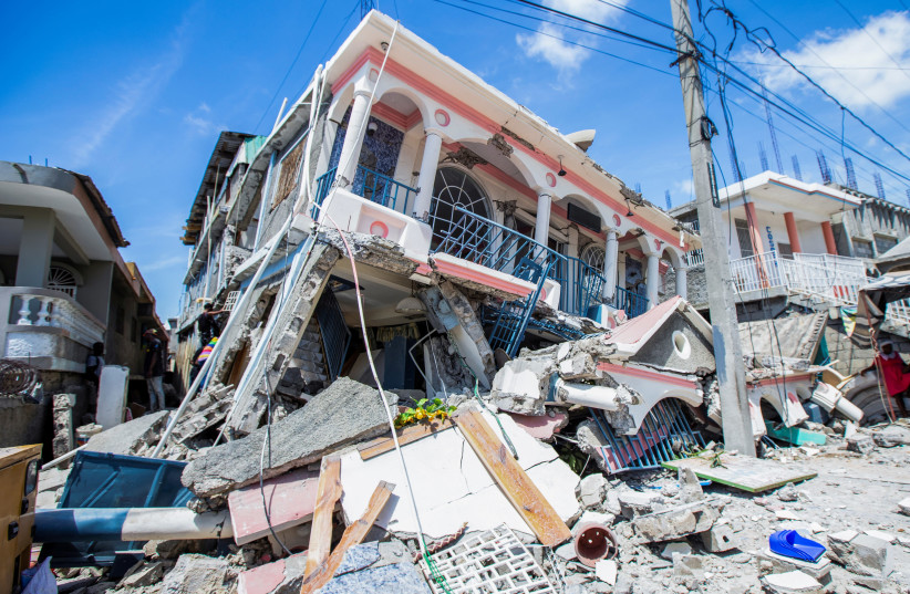 A view shows houses destroyed following a 7.2 magnitude earthquake in Les Cayes, Haiti August 14, 2021. (photo credit: REUTERS)
