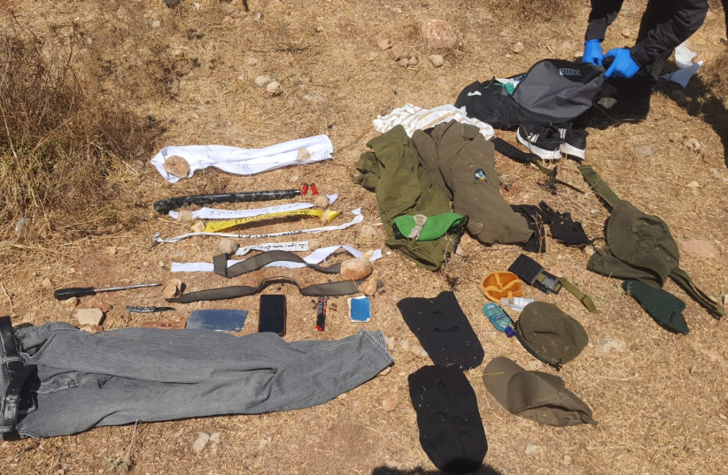  Uniform and weapons caught on Palestinian disguised as IDF soldier found near West Bank settlement (credit: IDF SPOKESPERSON'S UNIT)