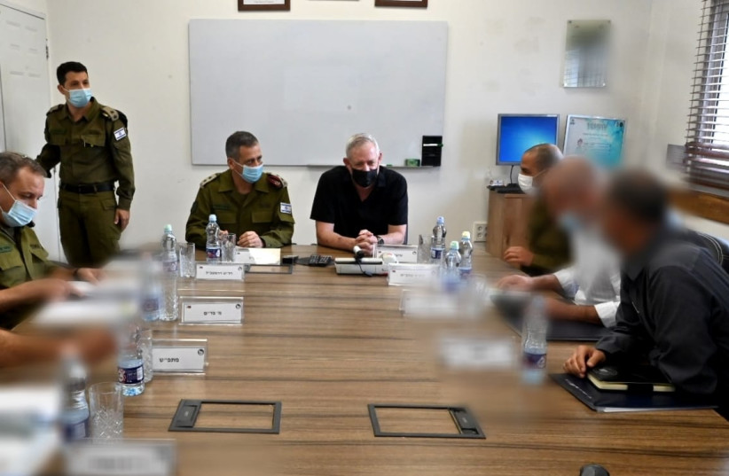   PM Naftali Bennett, IDF Chief of Staff Lt. -Gen. Aviv Kohavi and Defense Minister Benny Gantz at a situation assessment tour at the Gaza Division, August 17, 2021 (credit: KOBI GIDEON/GPO)