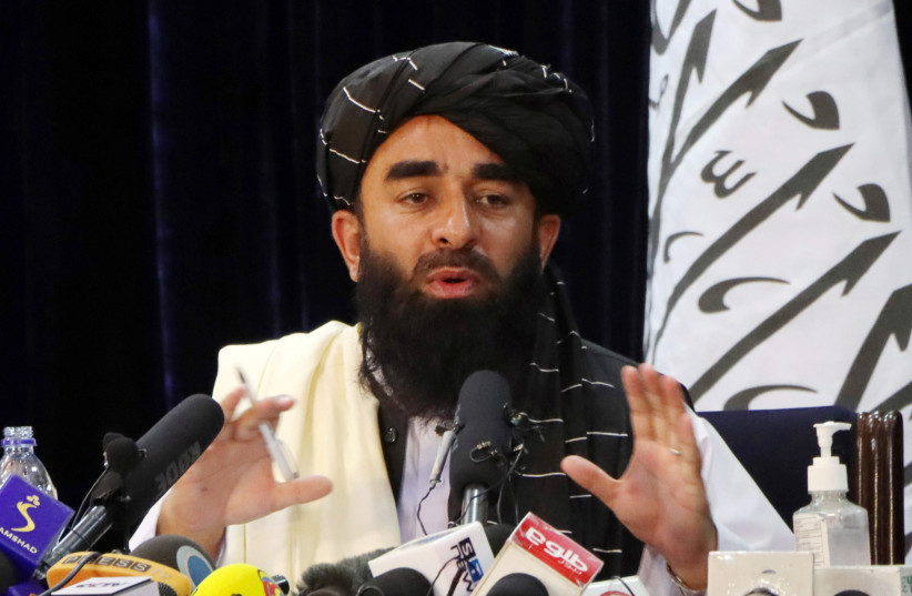  Taliban spokesman Zabihullah Mujahid speaks during a news conference in Kabul, Afghanistan August 17, 2021. (credit: REUTERS/STRINGER)