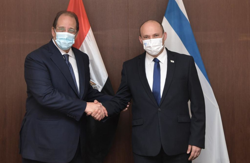  Prime Minister Naftali Bennett with Egyptian Intelligence chief Maj.-Gen. Abbas Kamel (credit: KOBY GIDEON/GPO)