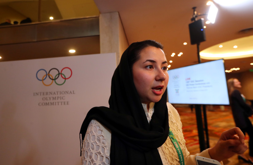  Samira Ashgari from Afghanistan, new member of the International Olympic Committee (IOC), talks to journalists at the end of the 133rd IOC session in Buenos Aires, Argentina October 9, 2018 (credit: REUTERS/MARCOS BRINDICCI)