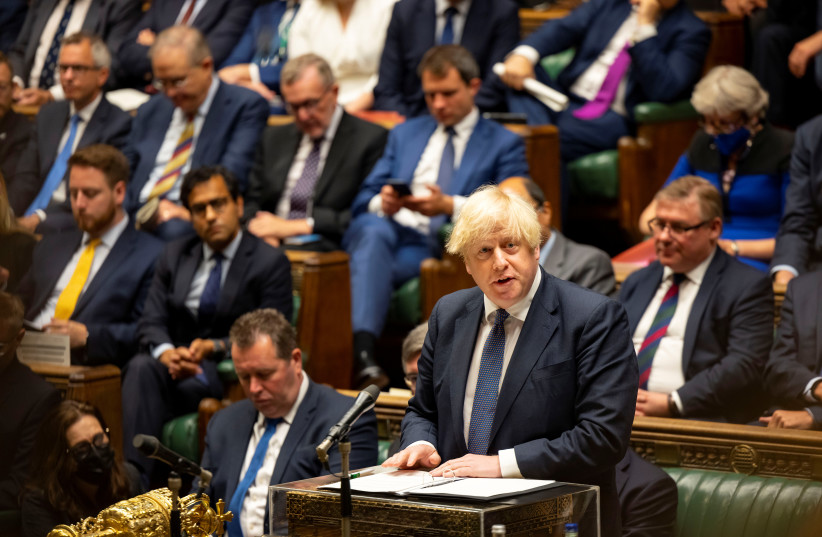  Britain's Prime Minister Boris Johnson speaks in the House of Commons. (photo credit: UK PARLIAMENT/ROGER HARRIS/HANDOUT VIA REUTERS)