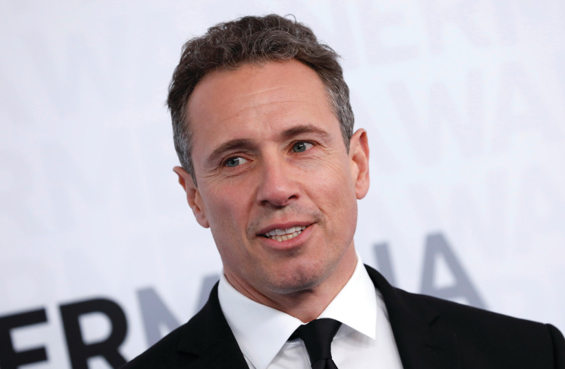 CNN NEWS ANCHOR Chris Cuomo poses as he arrives at a WarnerMedia Upfront event in New York City in May 2019.  (photo credit: MIKE SEGAR / REUTERS)