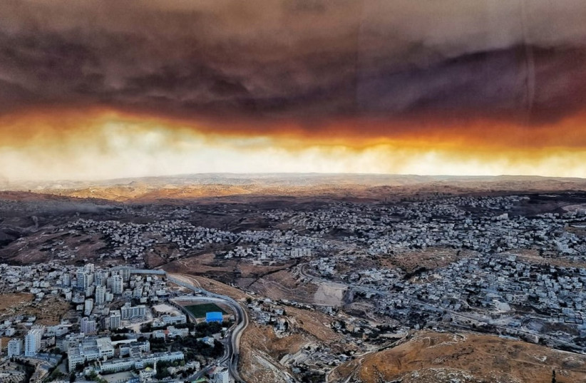  Thick black smoke hovers over densely populated area in Israel as wildfire blazes nearby. (photo credit: JNF-USA)