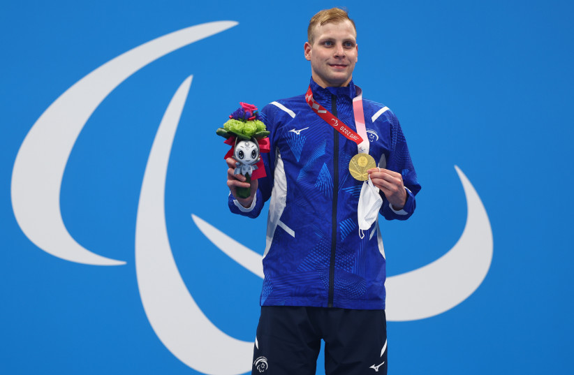  Men's 200m Individual Medley - SM7 Medal Ceremony – Tokyo Aquatics Centre, Tokyo, Japan - August 27, 2021. Gold medalist, Mark Malyar of Israel celebrates on the podium. (credit: REUTERS/MARKO DJURICA)