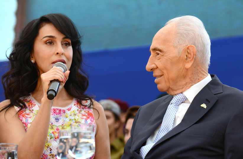  SHIMON PERES and singer Rita at the President’s Residence in Jerusalem in 2014.  (photo credit: HAIM ZACH/GPO)