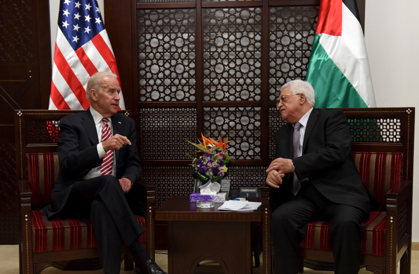 Then US vice-president Joe Biden meets with Palestinian President Mahmoud Abbas in the West Bank city of Ramallah March 9, 2016. (credit: REUTERS/DEBBIE HILL/POOL)