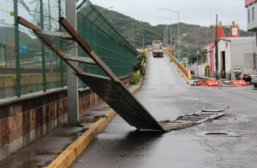  Debris lies in a street as Hurricane Nora approaches Manzanillo, in Colima state, Mexico August 28, 2021 (credit: REUTERS/JESUS LOZOYA)