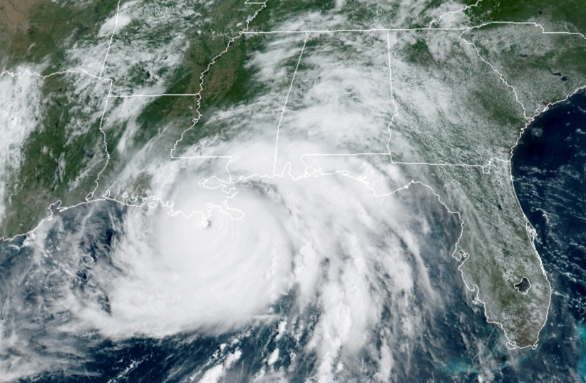  A satellite image shows Hurricane Ida in the Gulf of Mexico and approaching the coast of Louisiana, US, August 29, 2021. (photo credit: NOAA/HANDOUT VIA REUTERS)