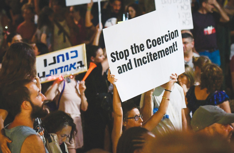  PROTESTORS IN Tel Aviv earlier this month object to the government's vaccination and Green Pass policies. (photo credit: AVSHALOM SASSONI/FLASH90)