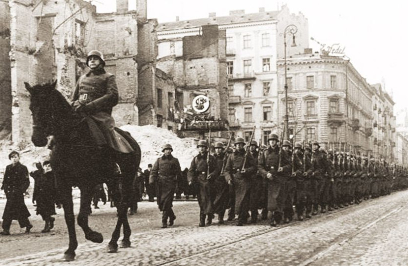  German troops entering Warsaw after surrender of city in 1939. (credit: Wikimedia Commons)