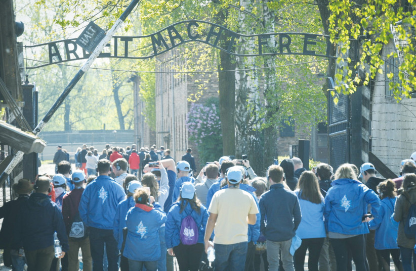  JEWISH YOUTH from all over the world participate in the March of the Living visit the Auschwitz concentration camp, in Poland, in 2019 (photo credit: YOSSI ZELIGER/FLASH90)