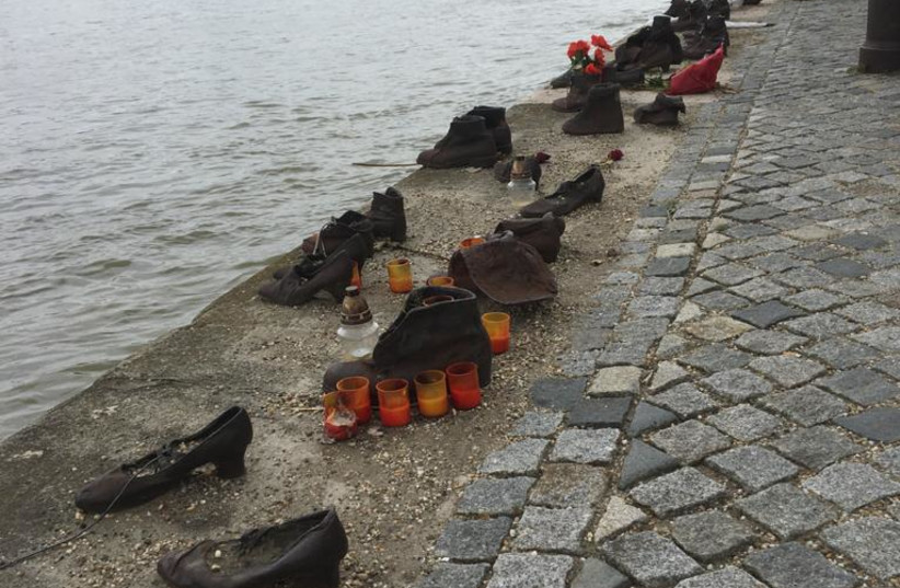   Memorial of bronze shoes in Budapest on the bank of the Danube, commemorating Hungarian Jews killed in the Holocaust (photo credit: MICHAEL STARR)