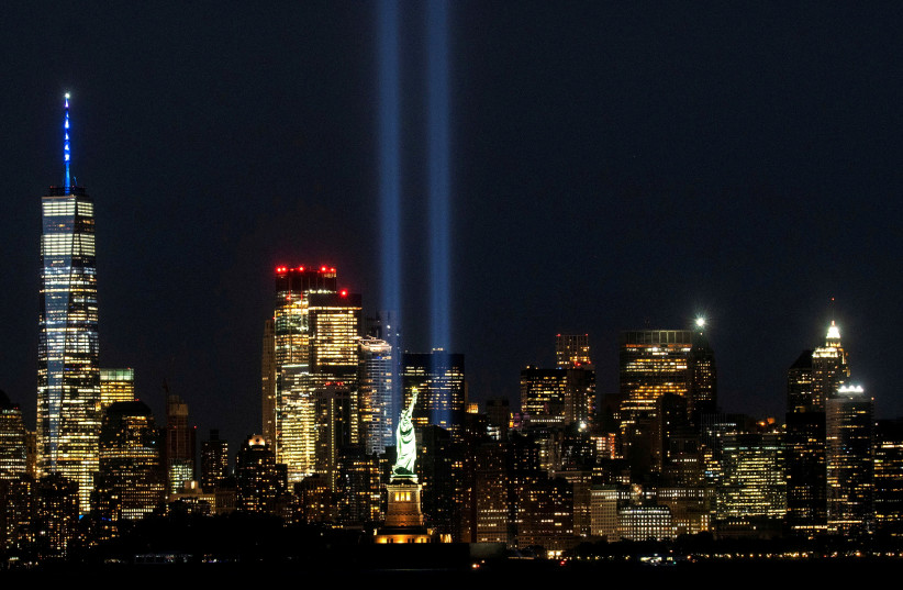  The Statue of Liberty and One World Trade Center are seen as the Tribute in Light shines in downtown Manhattan to commemorate the 19th anniversary of the September 11, 2001 attacks on the World Trade Center at the 9/11 Memorial & Museum in the Manhattan borough of New York City, New York, US, Sep (credit: REUTERS)