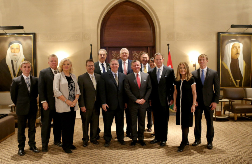  Joel Rosenberg (center) and a delegation of Evangelical leaders meet with Jordan's King Abdullah at his palace in Amman in November 2017. (credit: Courtesy)