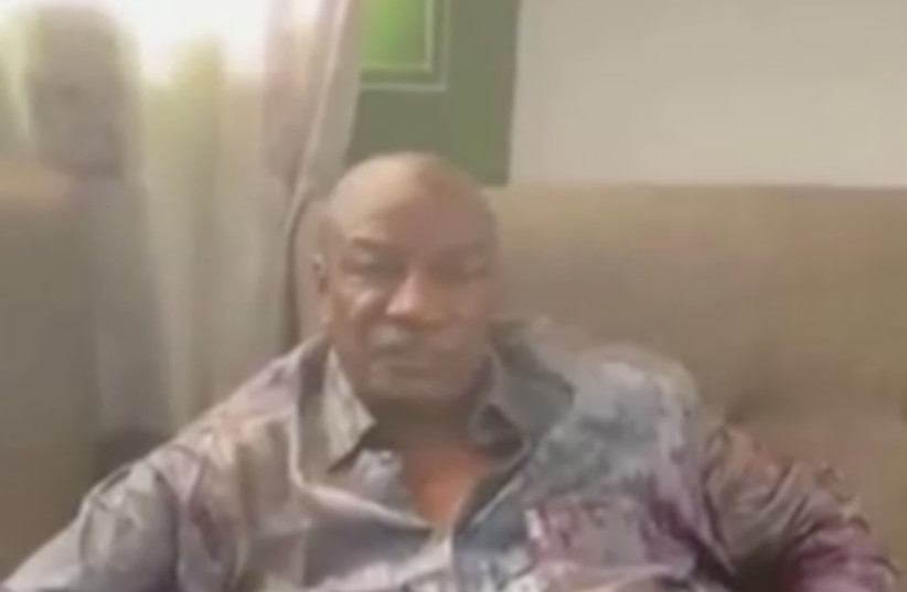  A screen grab from a video shared on social media, but not yet authenticated, claimed to show Guinea's President Alpha Conde detained by army special forces, in Conakry, Guinea September 5, 2021. (credit: VIA REUTERS)